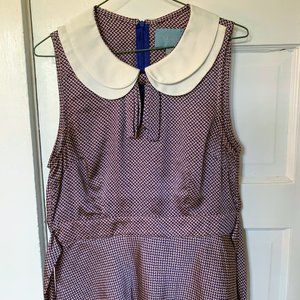 Sleeveless blouse with peter pan collar and